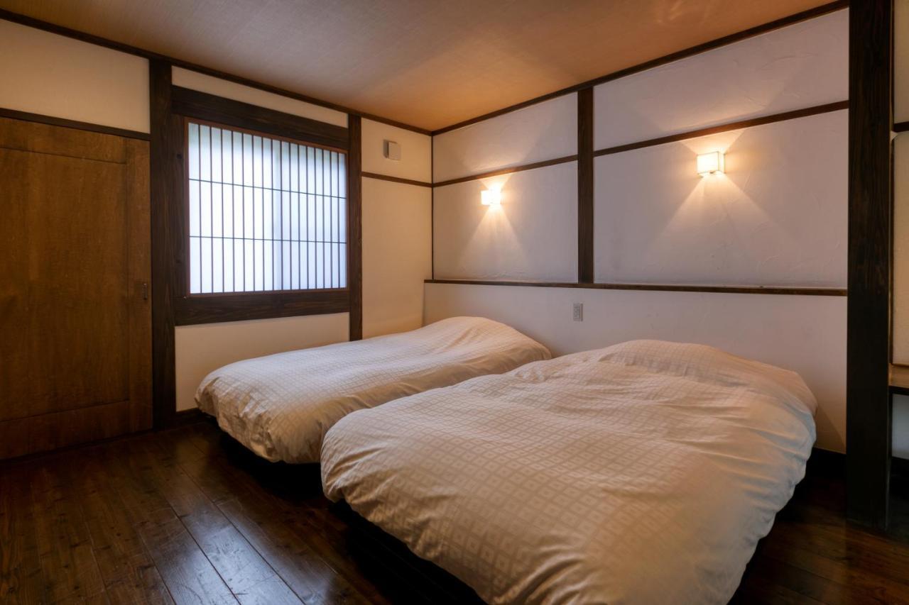 Готель Yufuin Onsen Toshoan Екстер'єр фото