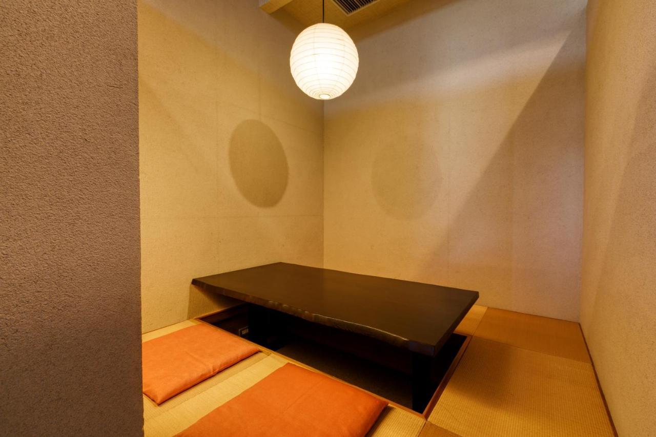 Готель Yufuin Onsen Toshoan Екстер'єр фото