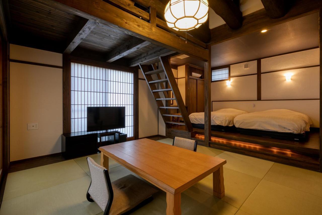 Готель Yufuin Onsen Toshoan Екстер'єр фото